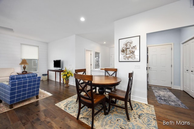 dining area with recessed lighting, baseboards, and hardwood / wood-style floors