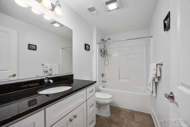 bathroom with bathtub / shower combination, vanity, toilet, stone finish flooring, and visible vents