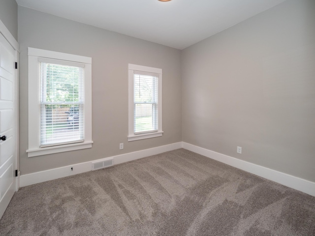 view of carpeted spare room