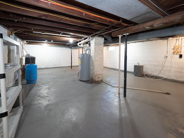 basement featuring water heater