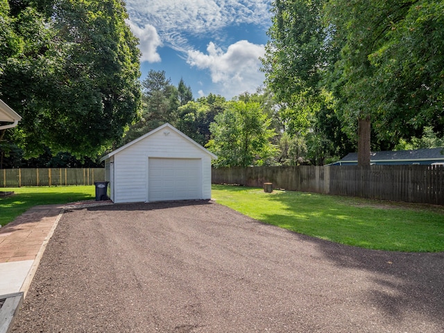 garage with a yard