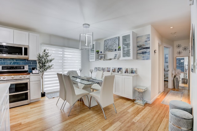 dining area featuring light hardwood / wood-style floors