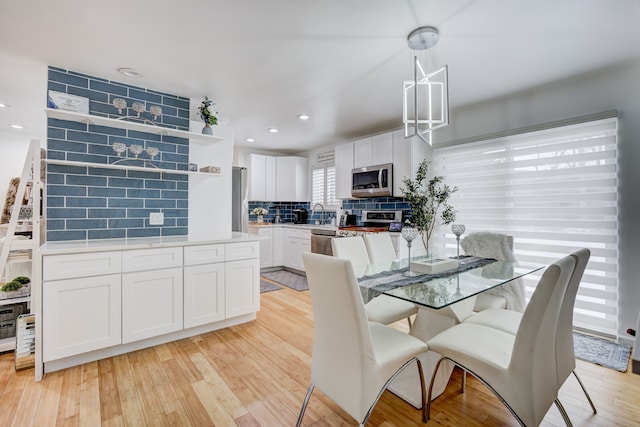 dining room featuring light hardwood / wood-style flooring