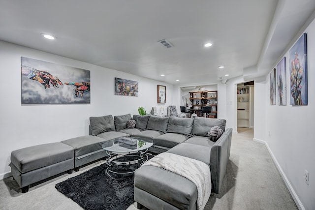 living room with light colored carpet