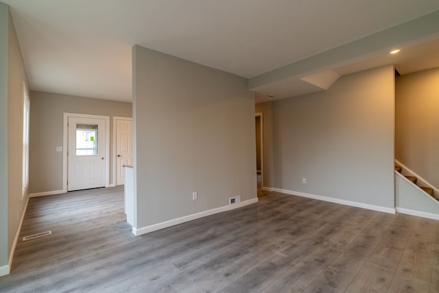 spare room featuring light hardwood / wood-style floors