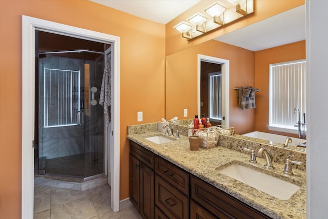 bathroom featuring vanity, tile patterned floors, and plus walk in shower