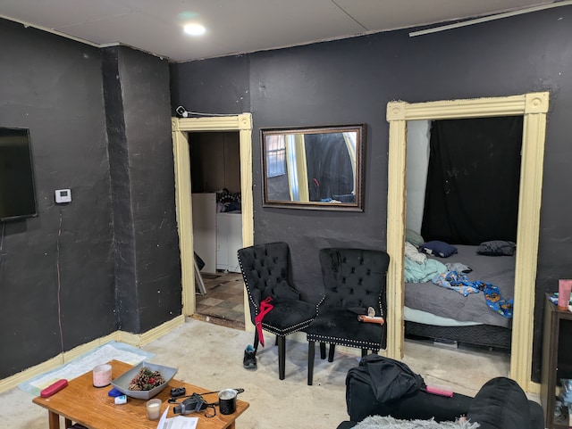 bedroom featuring concrete floors