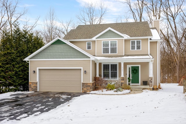 craftsman-style home featuring a garage and a porch