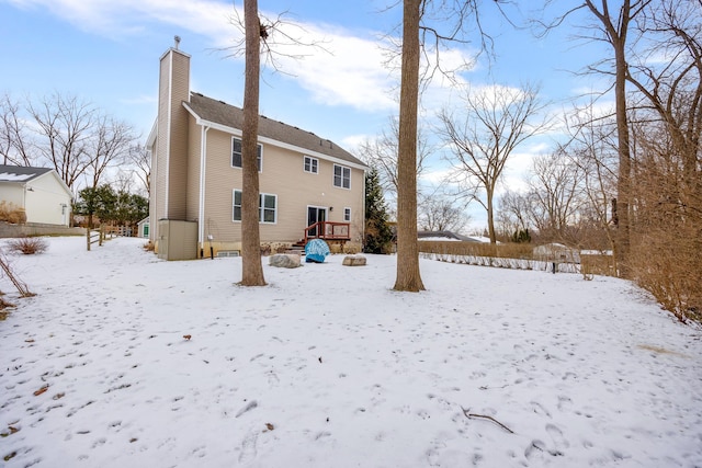 view of snow covered property