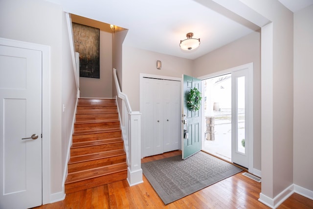 entrance foyer with light hardwood / wood-style floors