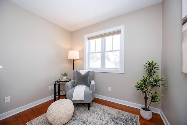 living area featuring hardwood / wood-style flooring