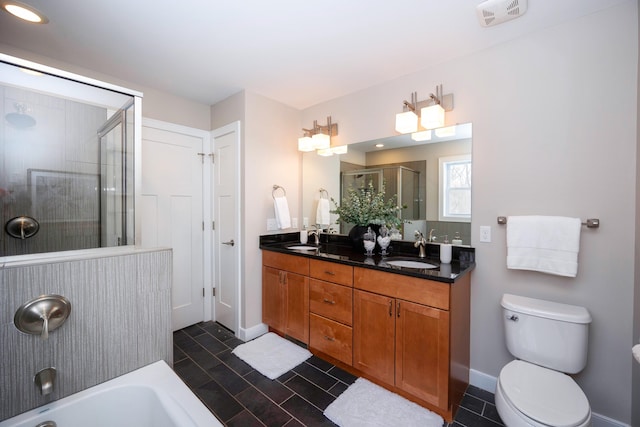 full bathroom featuring tile patterned flooring, shower with separate bathtub, vanity, and toilet