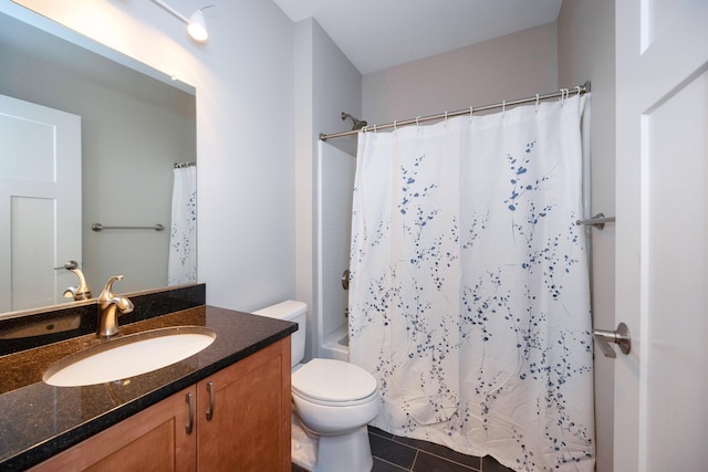 full bathroom with shower / bath combination with curtain, vanity, tile patterned floors, and toilet