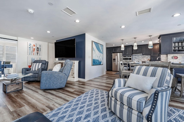 living room with wood-type flooring