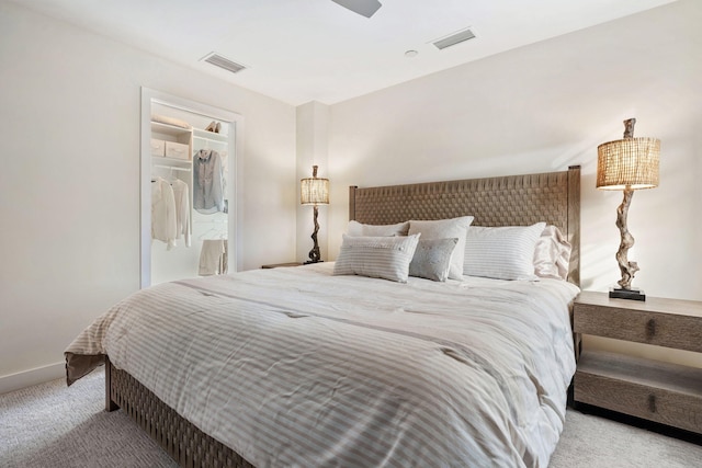 bedroom with light colored carpet