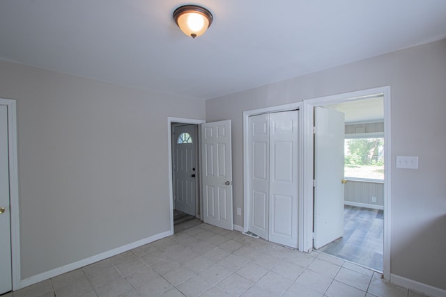 interior space with light tile patterned floors