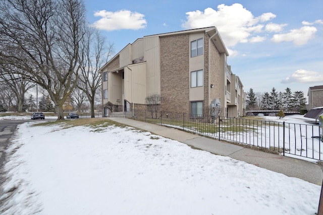 view of snow covered building