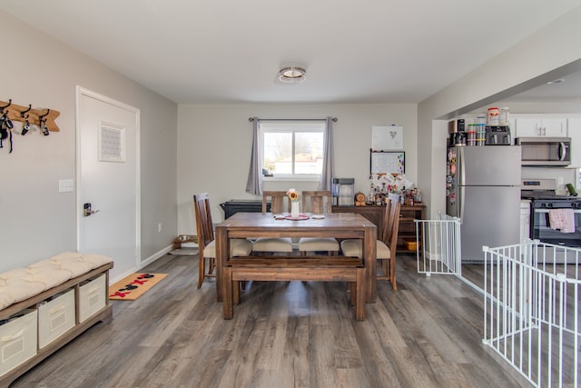 dining room featuring wood-type flooring