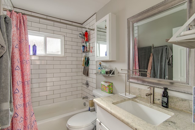 full bathroom with vanity, toilet, and shower / bath combo with shower curtain