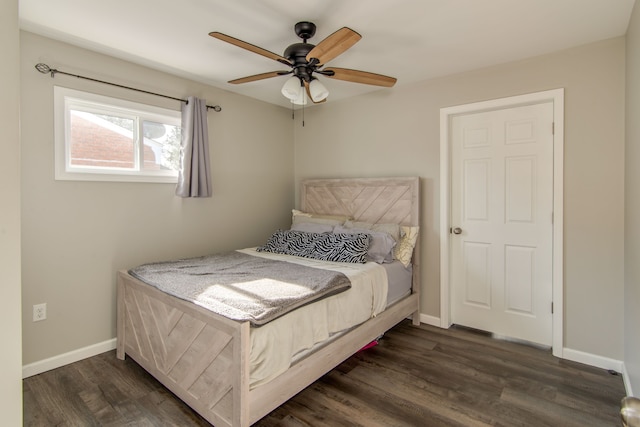 bedroom featuring ceiling fan and dark hardwood / wood-style flooring