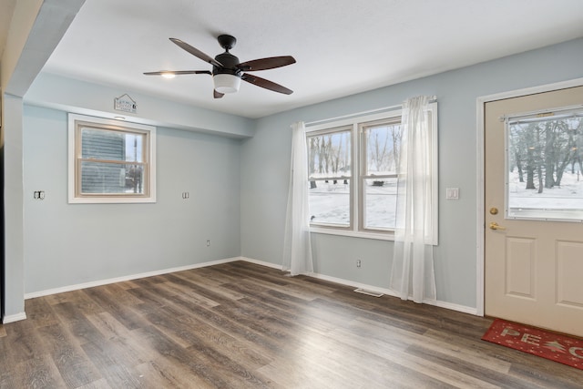 entrance foyer featuring dark hardwood / wood-style floors and ceiling fan