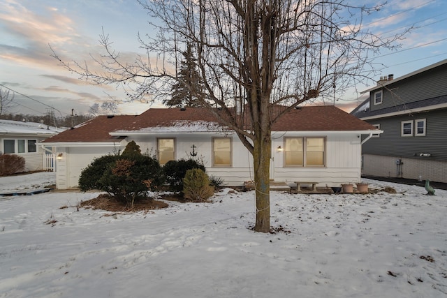 view of snow covered house