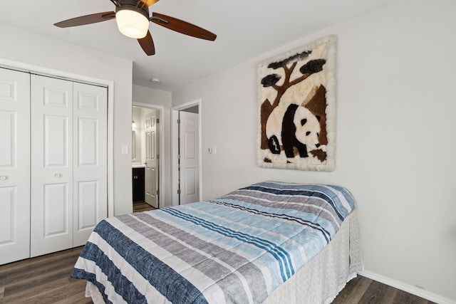 bedroom with ceiling fan, dark hardwood / wood-style flooring, and a closet