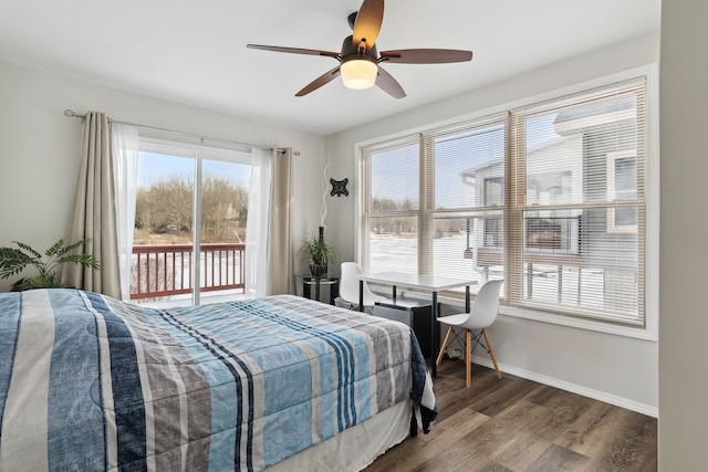 bedroom featuring dark wood-type flooring, access to outside, and ceiling fan