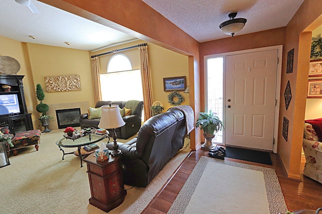 foyer entrance featuring a textured ceiling