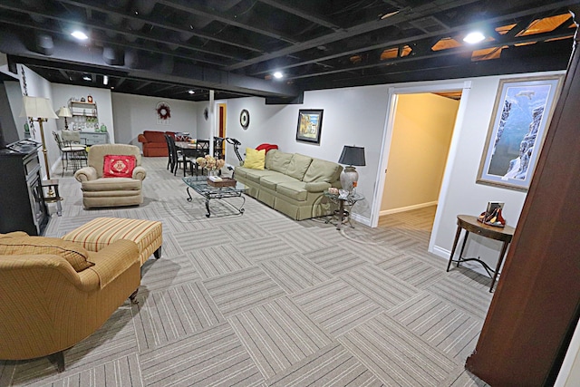 living room featuring light carpet