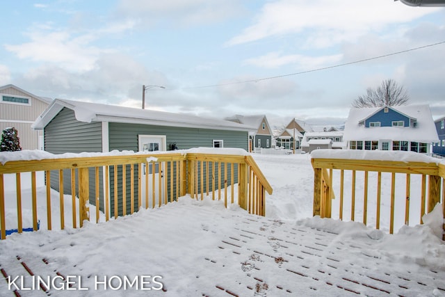 view of snow covered deck