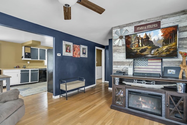 interior space with ceiling fan and light wood-type flooring