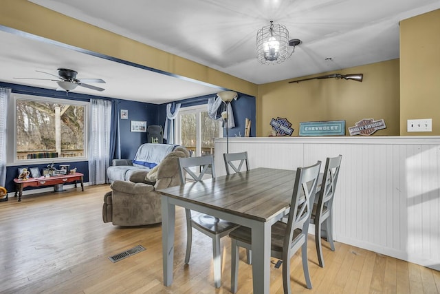 dining space featuring light wood-type flooring