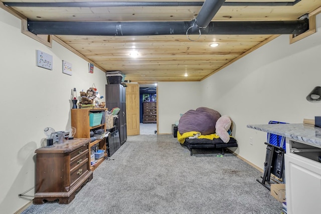 interior space featuring beam ceiling, wood ceiling, and carpet flooring