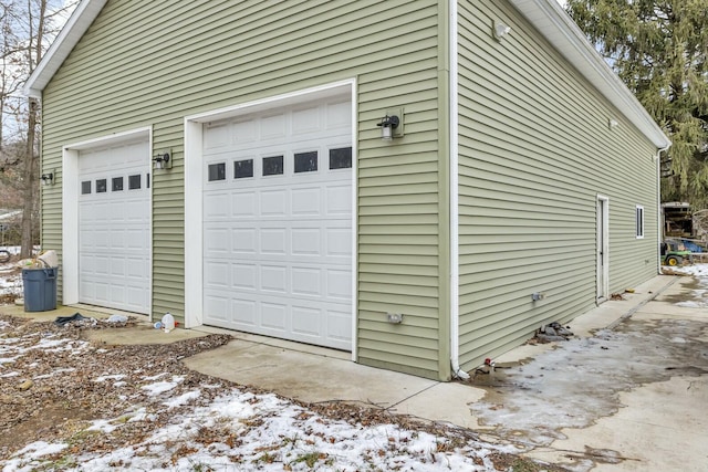 view of snow covered garage