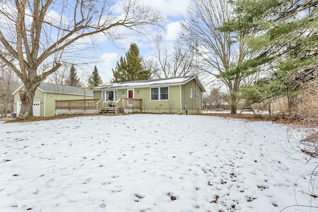 view of front of home with a wooden deck