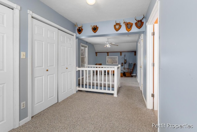 unfurnished bedroom featuring carpet floors and a closet