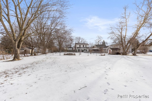 view of yard covered in snow