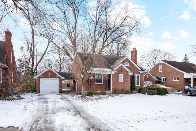 bungalow-style house featuring a garage