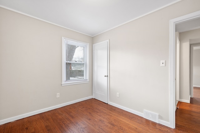 empty room featuring hardwood / wood-style floors