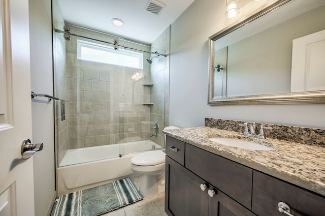 full bathroom with vanity, tile patterned flooring, toilet, and combined bath / shower with glass door