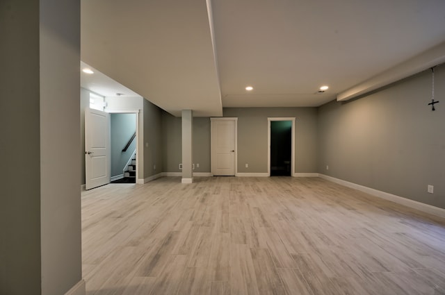 spare room with light hardwood / wood-style floors