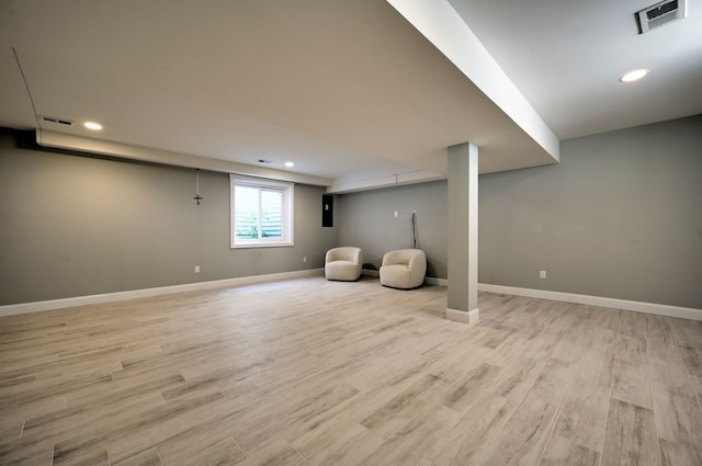 basement featuring light wood-type flooring