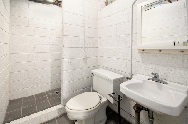 bathroom featuring toilet and a sink