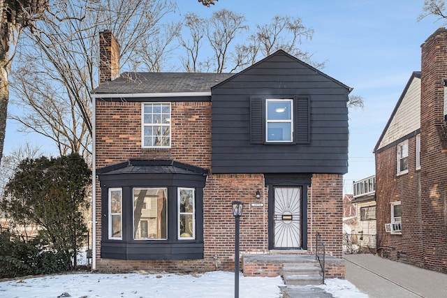 view of front of home featuring cooling unit