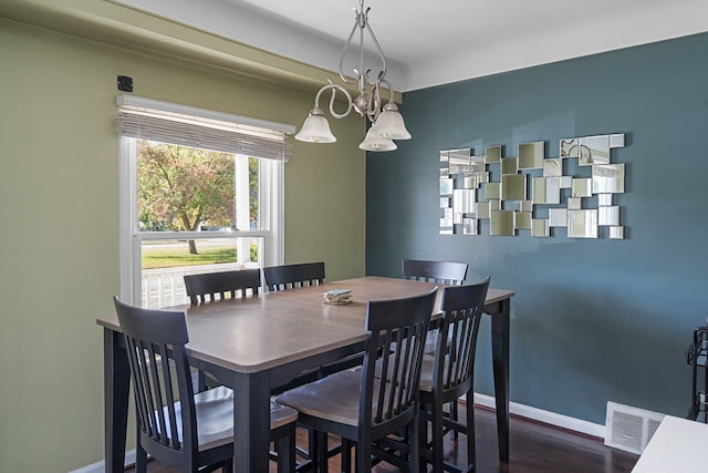 dining room featuring dark wood-type flooring