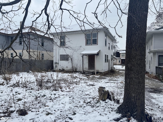 view of snow covered house