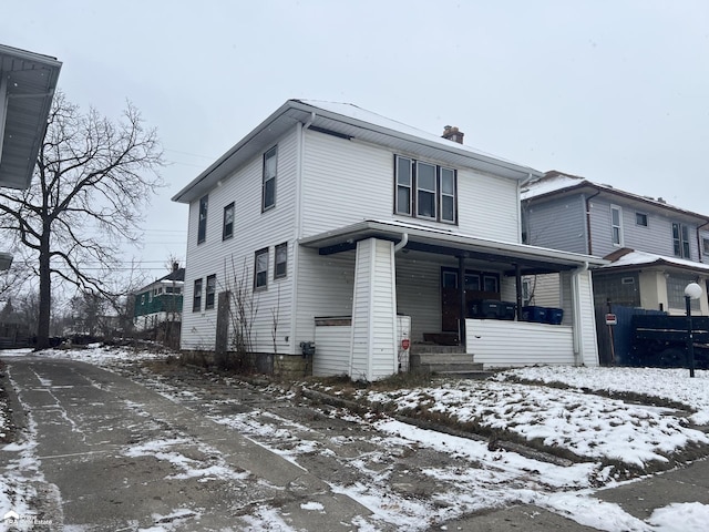 view of property with a porch