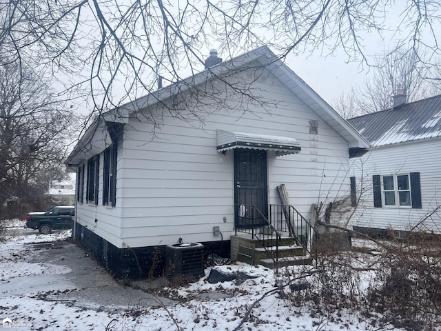 bungalow-style house with central AC