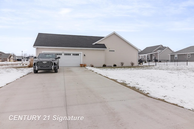 view of front of home with a garage